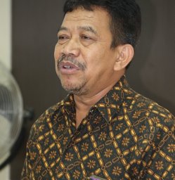 Dr. Agus Muharam, M.Pd.